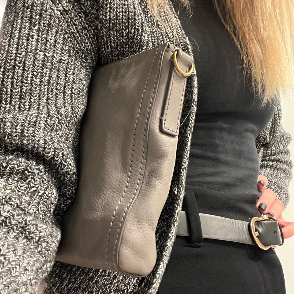 Neutral Fossil leather bag. Can be carried as a clutch or crossbody bag.